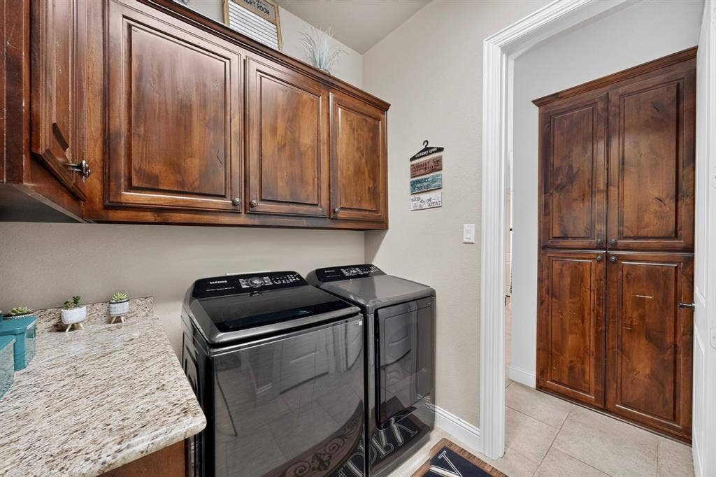 5020 Lindy Court, Midlothian, TX 76065 Built-in cabinetry, granite-style countertop, and tiled flooring