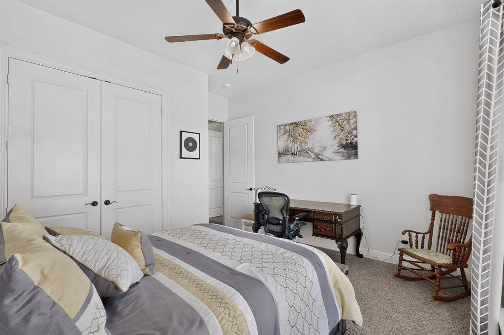 5020 Lindy Court, Midlothian, TX 76065 Recessed ceiling lighting, ceiling fan with light kit, white interior doors with dark hardware, and neutral wall tones