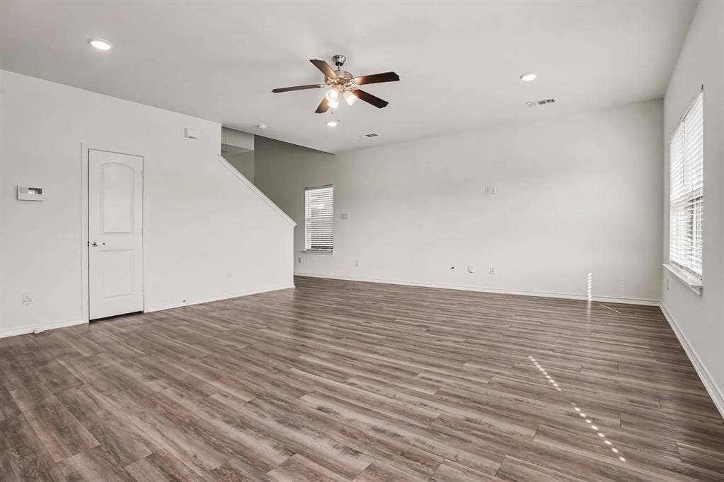257 Michelle Drive, Grand Prairie, TX 75051 Another view of the living room shows the open floor space and connection to the rest of the home.