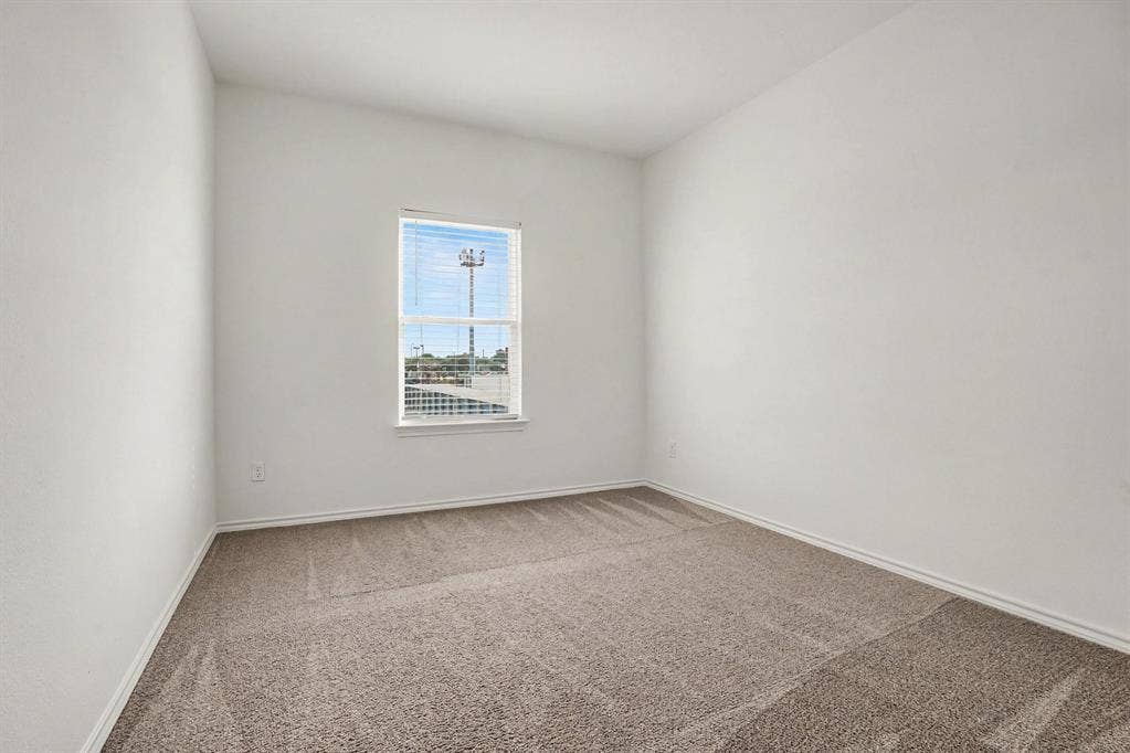 257 Michelle Drive, Grand Prairie, TX 75051 A secondary bedroom offers flexible space for sleeping, guests or a home office.