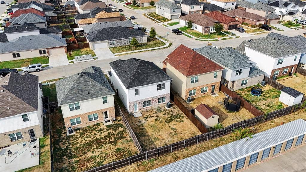 257 Michelle Drive, Grand Prairie, TX 75051 A neighborhood aerial viewed from behind the home.