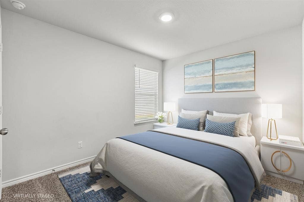 Recessed lighting, window with blinds, and carpeting (virtually staged room 2)
