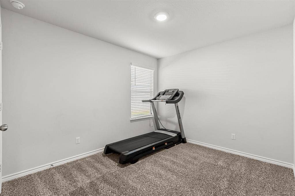 Neutral wall finishes, recessed lighting, and carpeted flooring (actual room 2)