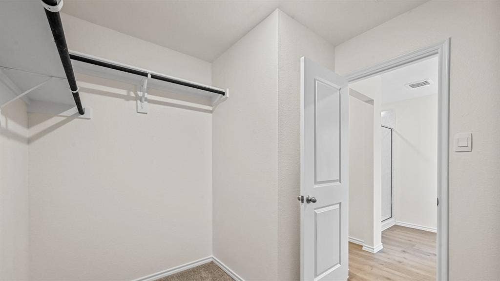 Built-in closet shelving and hanging rods