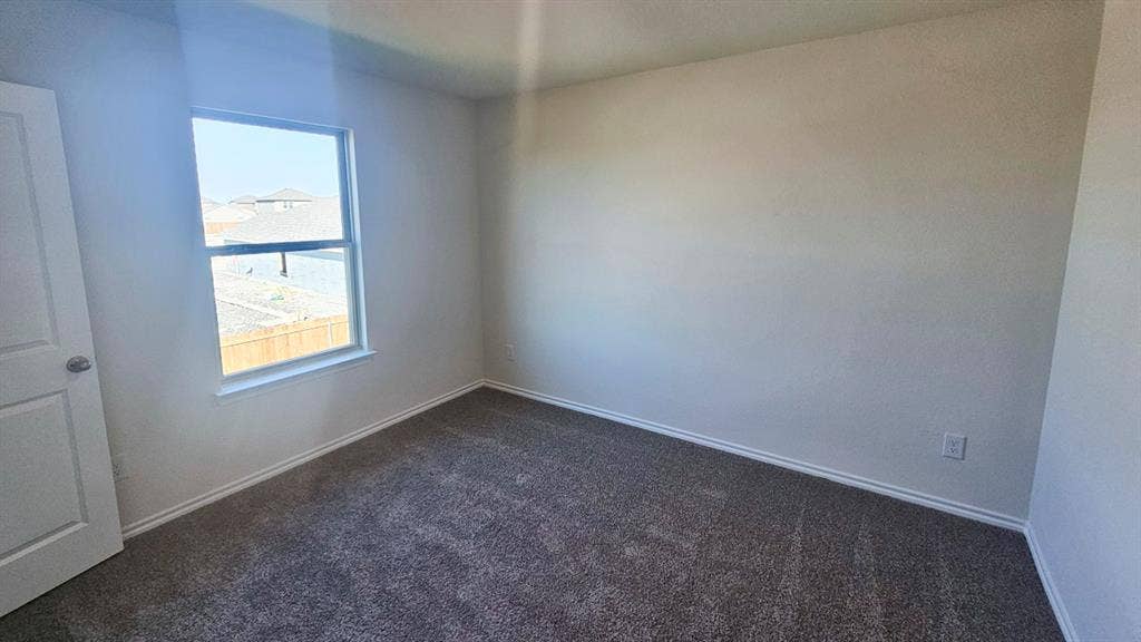 Neutral tone wall paint with white trim accents