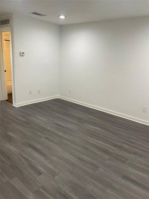 321 E 8th Street, #203, Dallas, TX 75203 Wood-finish flooring, recessed lighting, and crisp white walls