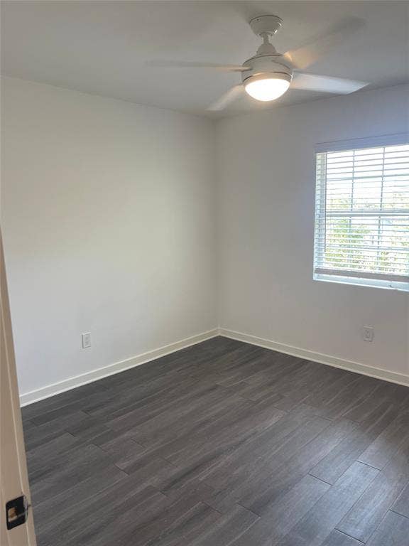 321 E 8th Street, #203, Dallas, TX 75203 Wood-finish flooring, white walls, window with blinds, and ceiling fan with integrated lighting