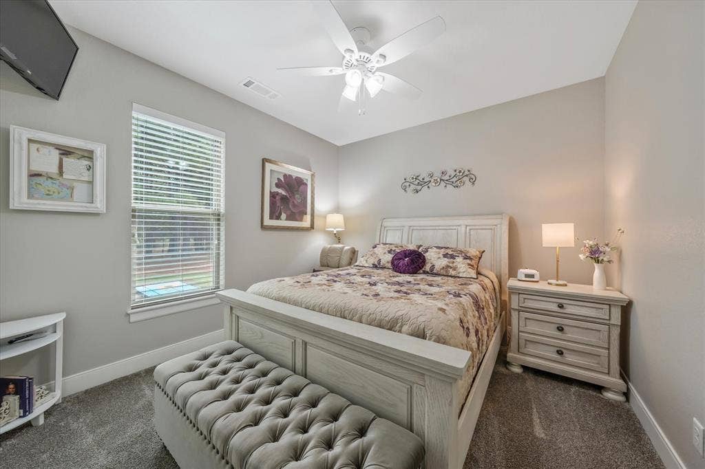 14486 Meadow Glen, Lindale, TX 75771 Recessed window with blinds, overhead ceiling fan, and carpeted flooring