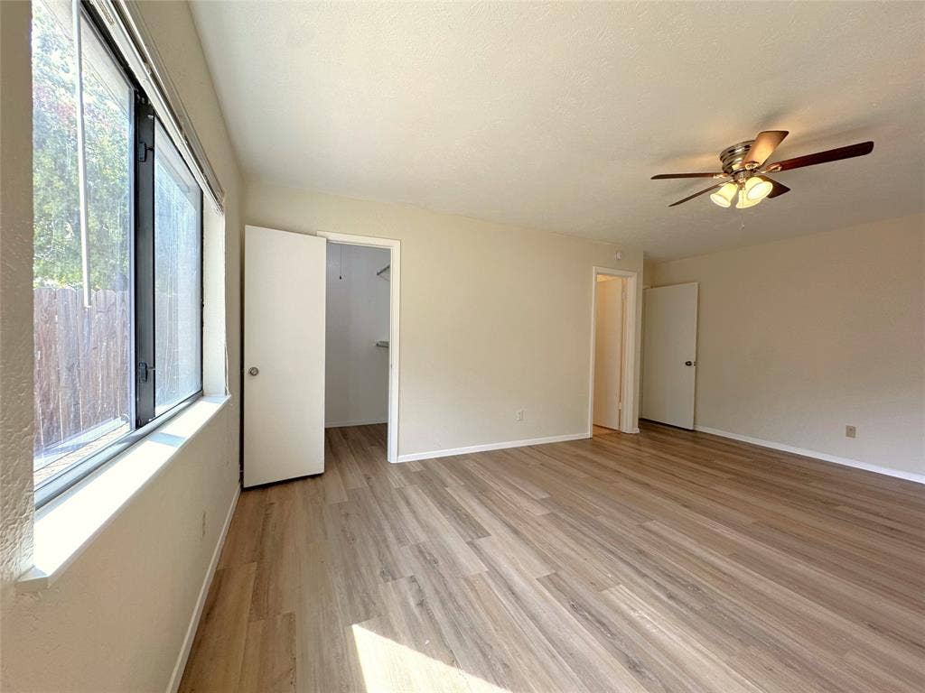 2525 Norway Drive, Garland, TX 75040 Primary bedroom has a walk-in closet