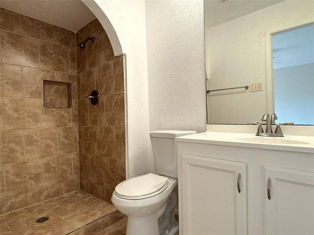 2525 Norway Drive, Garland, TX 75040 Primary bathroom has a walk-in shower