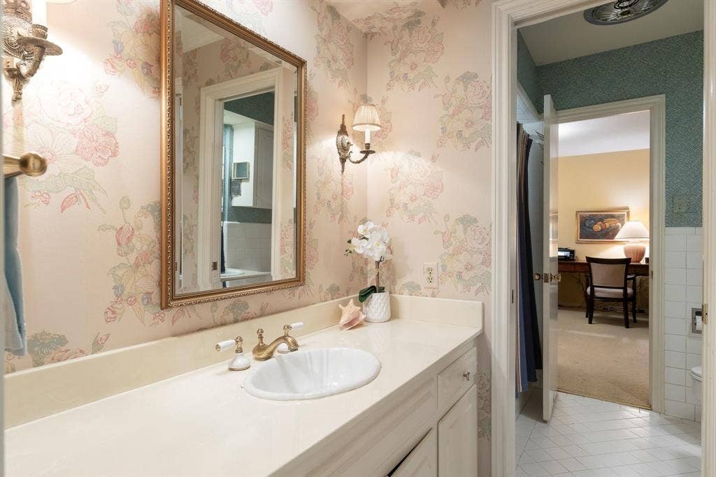 6950 Midcrest Drive, Dallas, TX 75254 Half Bathroom off Bedroom 2.