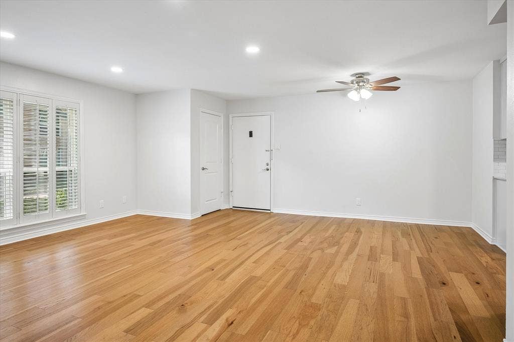 View Of Dining Area And Living Room - Wood Flooring Floors And Ceiling Fans Throughout