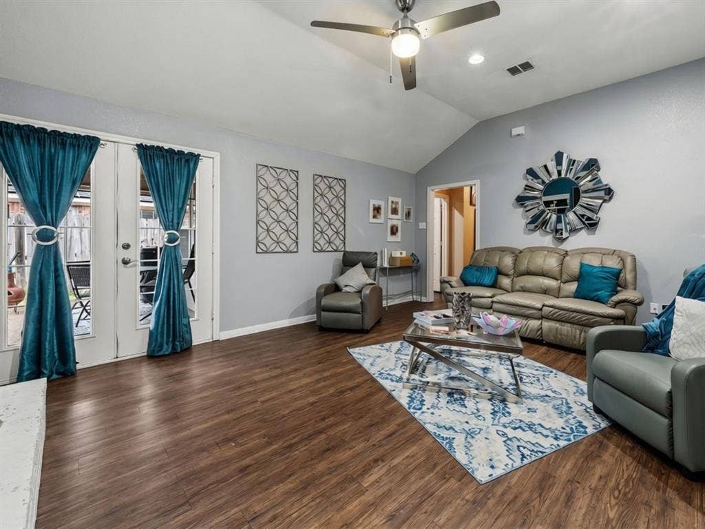 3012 Pinto Loop, Robinson, TX 76706 Vaulted ceiling with a ceiling fan, wood-finish flooring, recessed lighting, and double glass-paneled doors