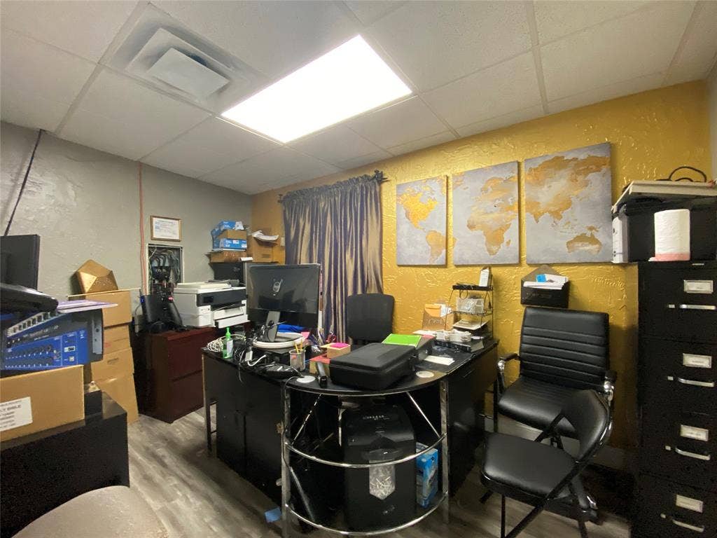 7041 Military Parkway, Dallas, TX 75227 Office area with a drop ceiling and wood-type flooring