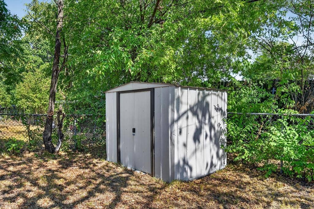 3320 Shorewood Drive, Mesquite, TX 75150 Metal utility shed with a gable roof