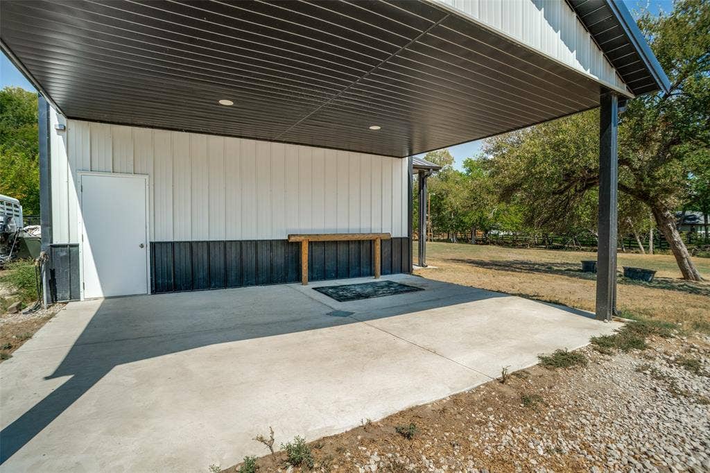 18 Brookhaven Drive, Lucas, TX 75002 Large covered area includes wash rack area.