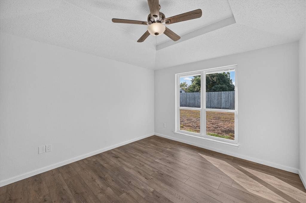 12 States Avenue, Midlothian, TX 76065 View from entry door of primary bedroom with great natural light!