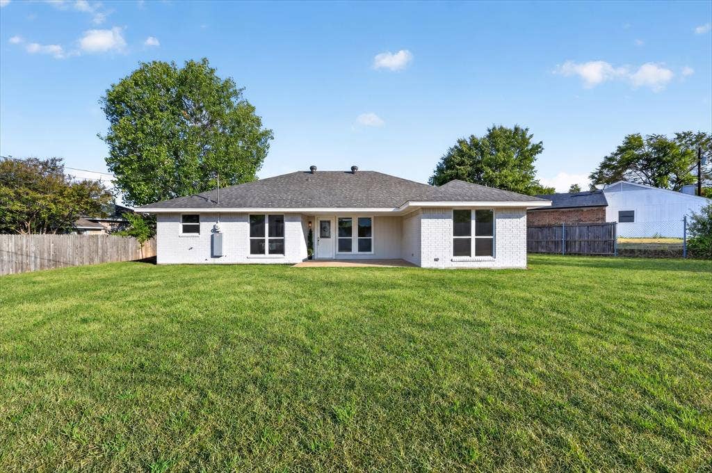 12 States Avenue, Midlothian, TX 76065 Huge backyard with so much room for activities! Grass is digitally enhanced.