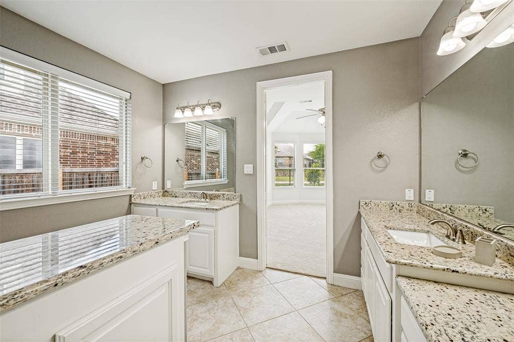Primary bath with dual vanities