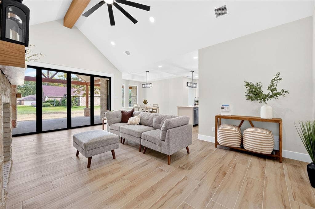 120 Springwood Road, Enchanted Oaks, TX 75156 Vaulted ceiling with exposed wood beam, recessed lighting, and a ceiling fan