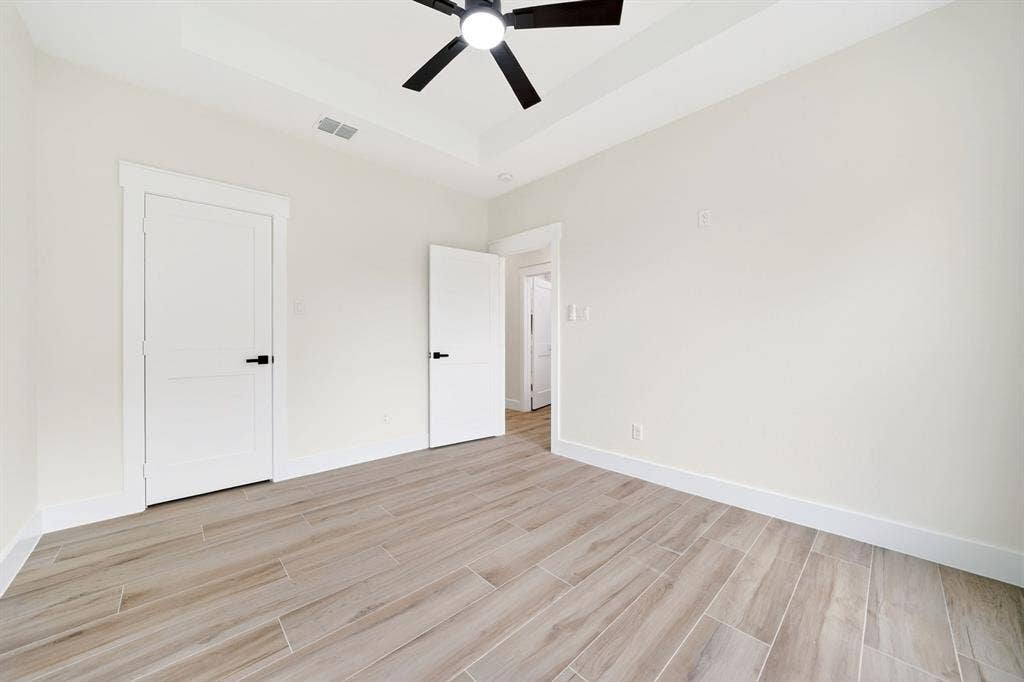 120 Springwood Road, Enchanted Oaks, TX 75156 Tray ceiling with recessed lighting