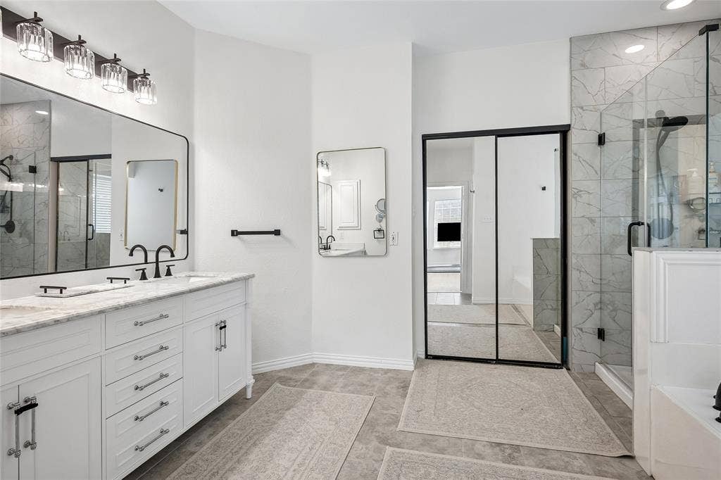 3801 Kite Meadow Drive, Plano, TX 75074 Dual vanity with stone countertop and integrated sinks