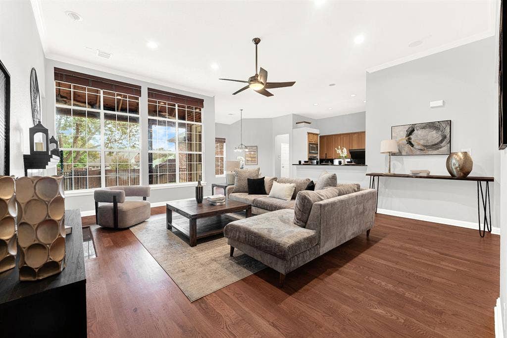 4433 Creekbend Circle, Richardson, TX 75082 Family room is open to kitchen and breakfast area.