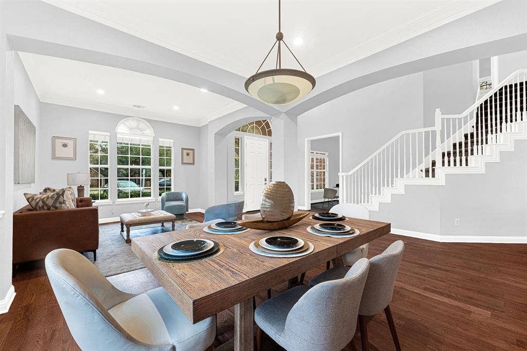 4433 Creekbend Circle, Richardson, TX 75082 Light color palette with rich hardwood floors throughout the primary living spaces