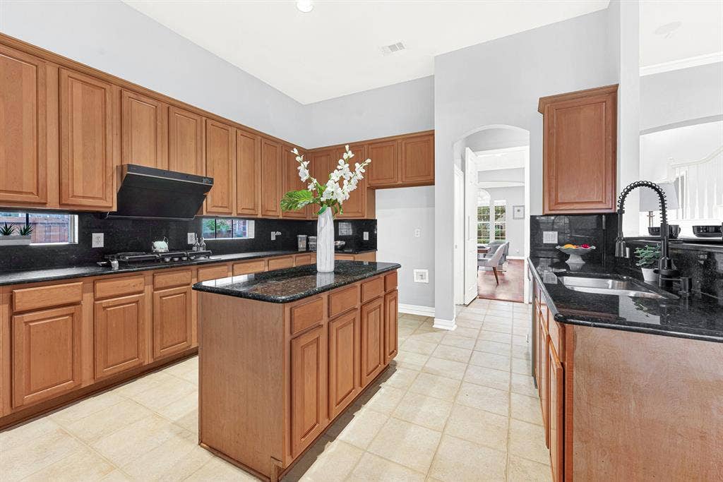 4433 Creekbend Circle, Richardson, TX 75082 Kitchen island with additional storage