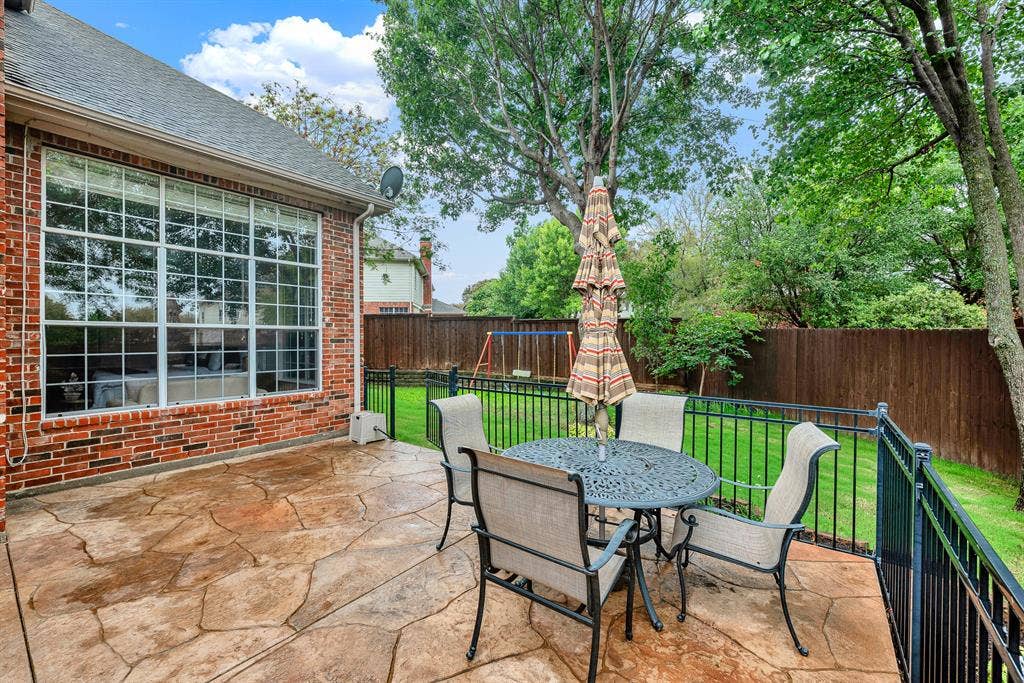 4433 Creekbend Circle, Richardson, TX 75082 Extended patio perfect for morning coffee
