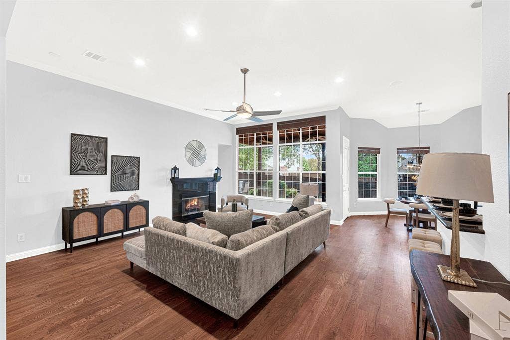 4433 Creekbend Circle, Richardson, TX 75082 Spacious family room affords great views of the pretty backyard