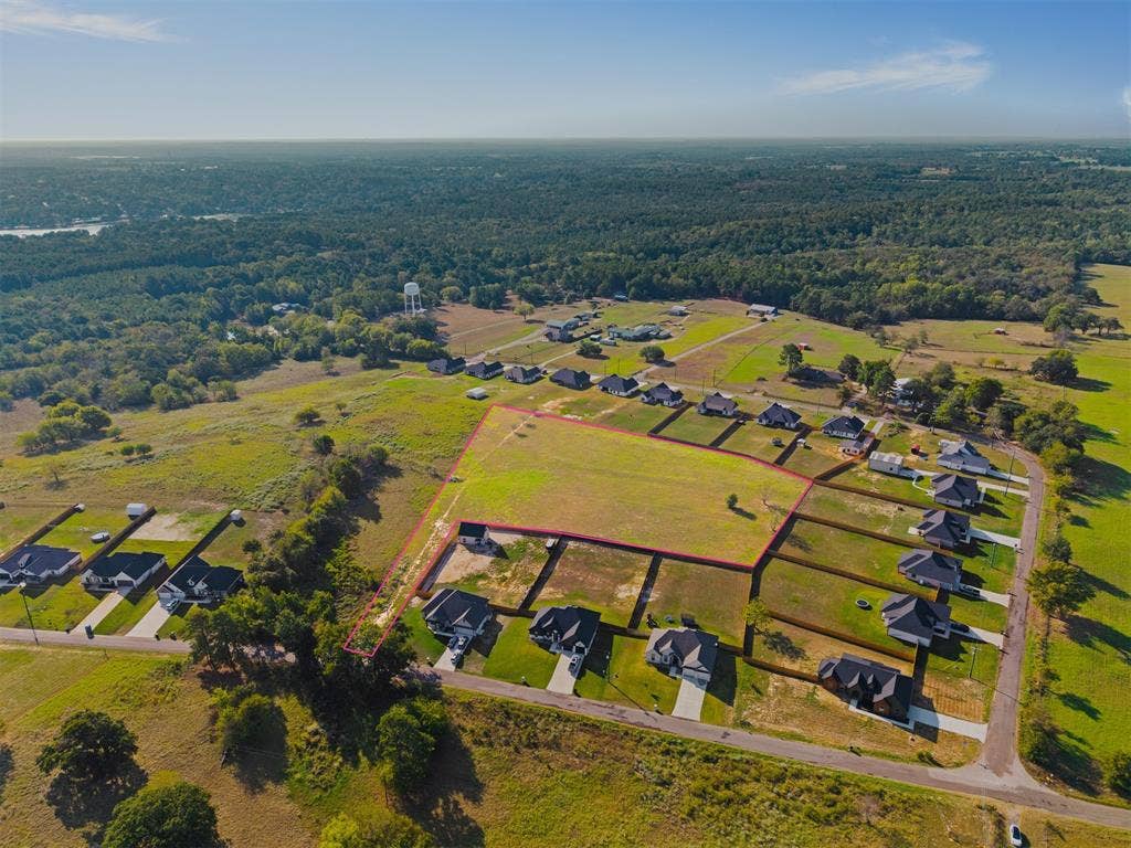 15610 County Road 436, Lindale, TX 75771 Expansive undeveloped lot featuring clear land and defined boundaries
