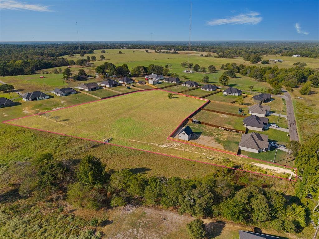 15610 County Road 436, Lindale, TX 75771 Expansive land parcel featuring clear boundaries, surrounded by established residential properties