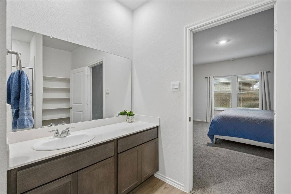 3719 Mildren Bend, Crandall, TX 75114 Looking into the bedroom from the ensuite bathroom