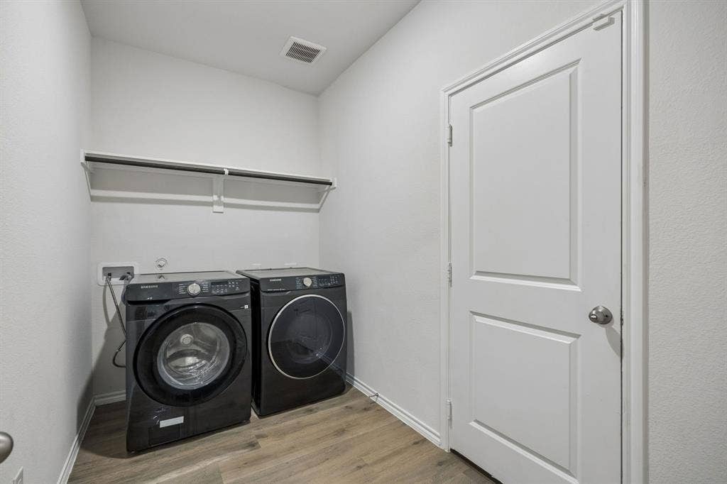 3719 Mildren Bend, Crandall, TX 75114 Laundry room with open storage