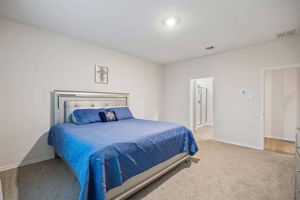 3719 Mildren Bend, Crandall, TX 75114 Primary suite featuring recessed lighting.