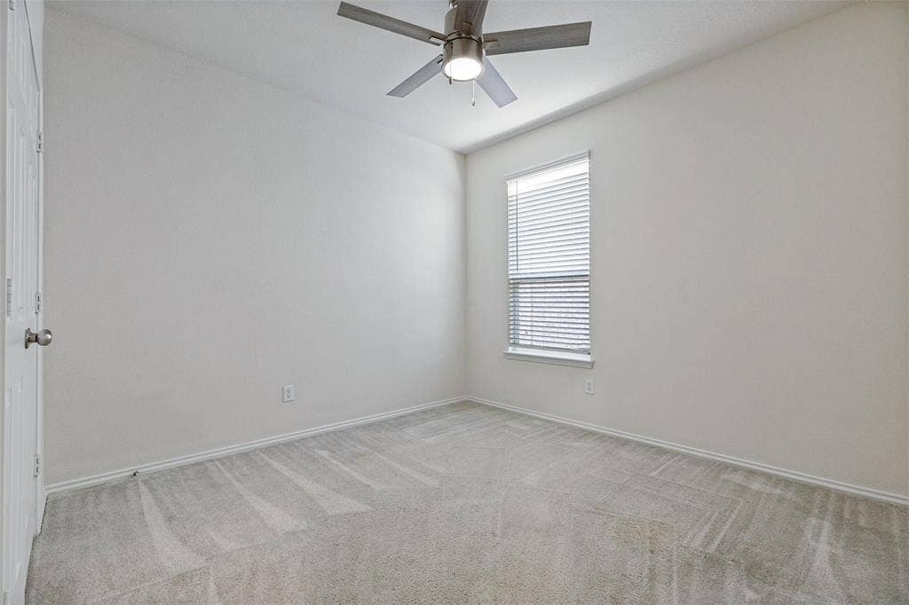 Another secondary bedroom at front of house