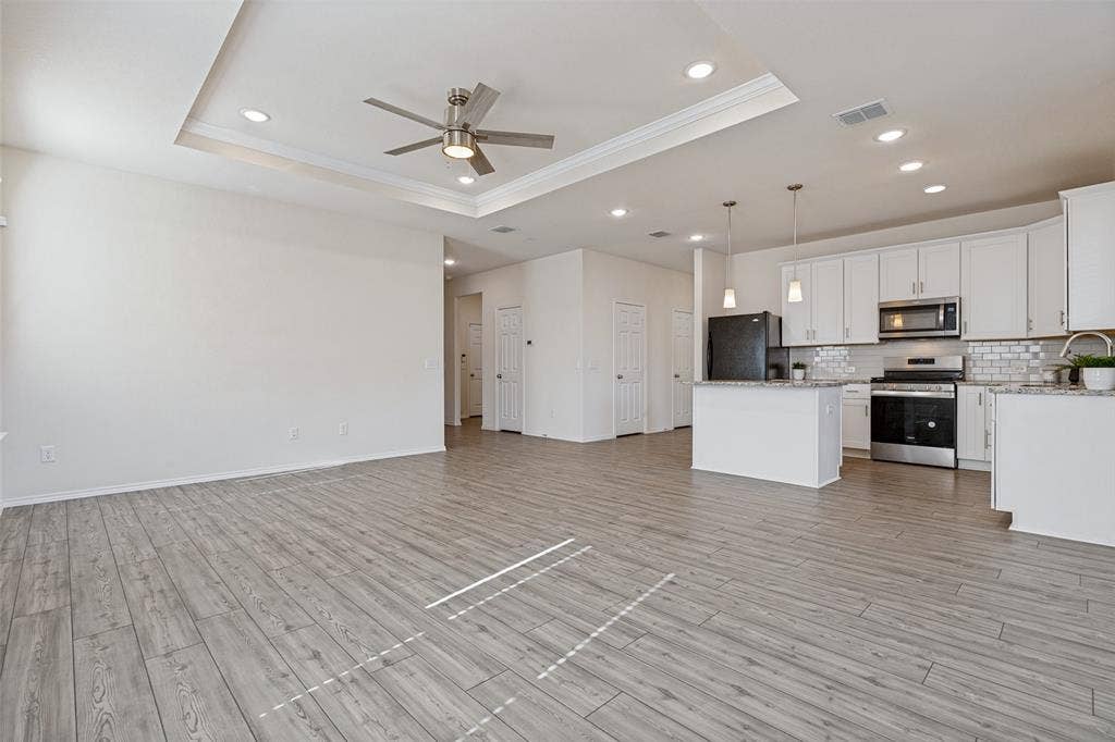 Luxury vinyl plank throughout the main areas
