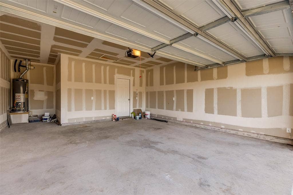 Garage has an tandem extension that is 8 ft x 5.6 ft perfect for golf cart, motorcycle, bicycles, lawn equiipment or storage