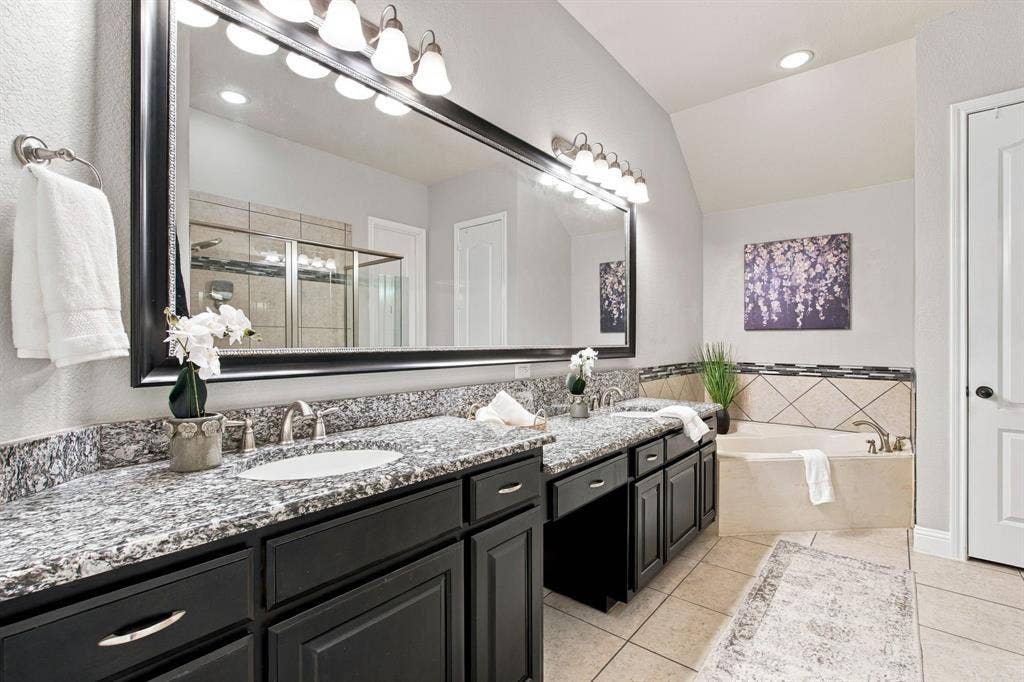 PRIMARY BATH WITH SOAKING TUB AND TWO SINKS