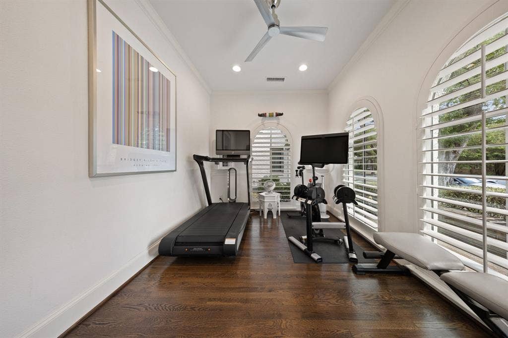5709 Kenwood Avenue, Dallas, TX 75206 Wood-finish flooring, recessed lighting, and a ceiling fan