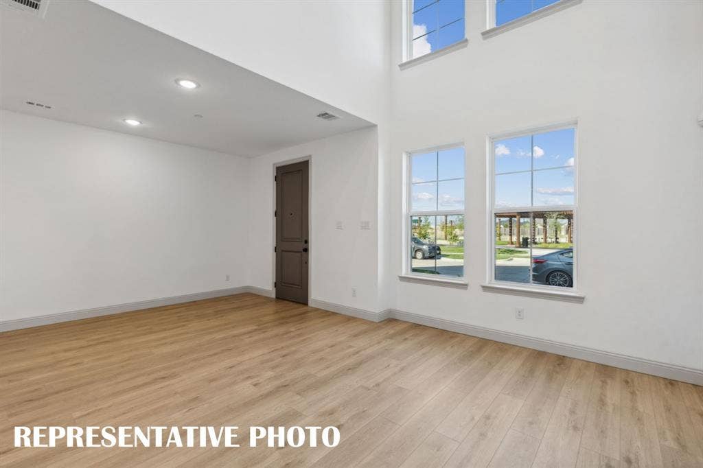 1028 Stockton Drive, Allen, TX 75013 Welcome into your beautiful and stylish, new lock and leave lifestyle home featuring double stacked windows across the front of this gorgeous home! REPRESENTATIVE PHOTO