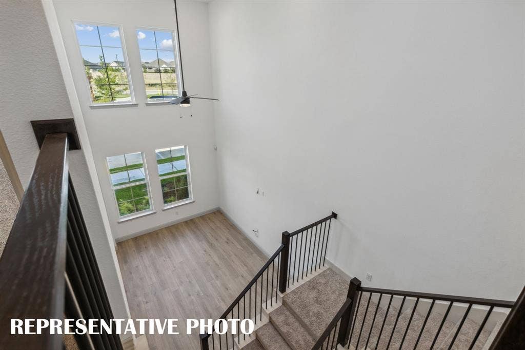 1028 Stockton Drive, Allen, TX 75013 Your second floor landing offers a fantastic view of your new home! REPRESENTATIVE PHOTO