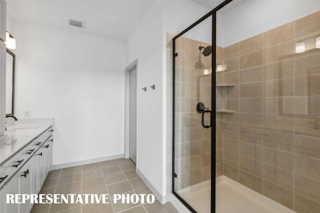 1028 Stockton Drive, Allen, TX 75013 This oversized owner's shower is a dream come true! REPRESENTATIVE PHOTO