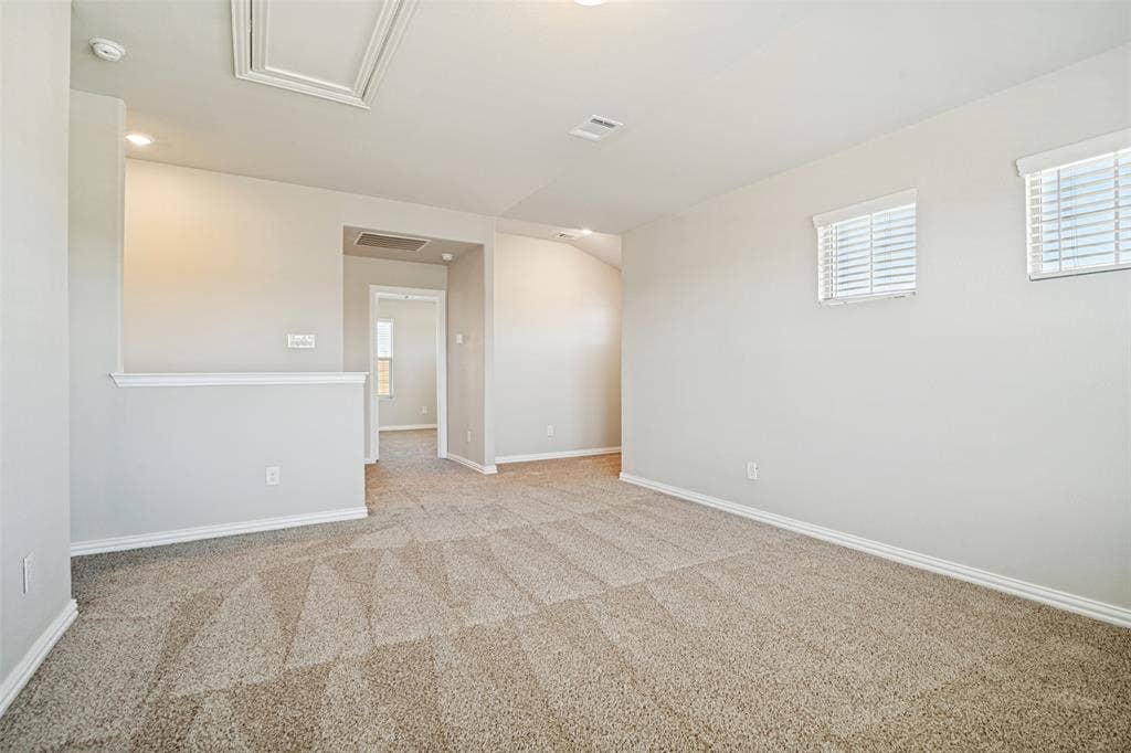 2403 Rocky Mountain Drive, Royse City, TX 75189 Carpeted flooring, recessed lighting, white trim, and two windows with blinds