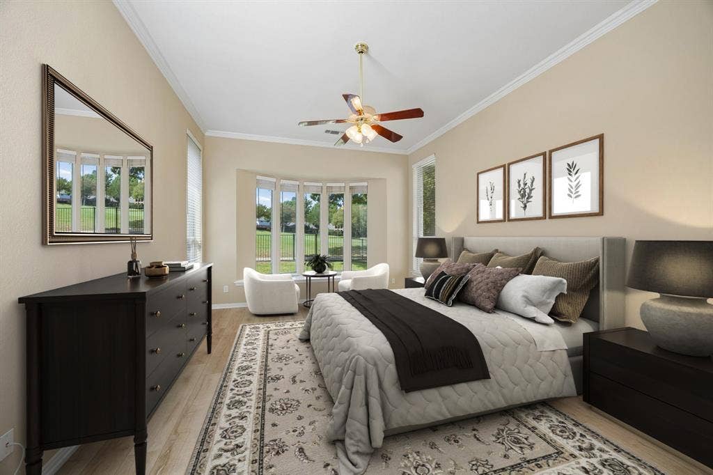 1106 Hills Creek Drive, McKinney, TX 75072 The first floor primary bedroom enjoys views of the backyard from the window seat with bay window. The spacious room allows space for a small sitting area to enjoy those views. (Virtually staged to show potential.)