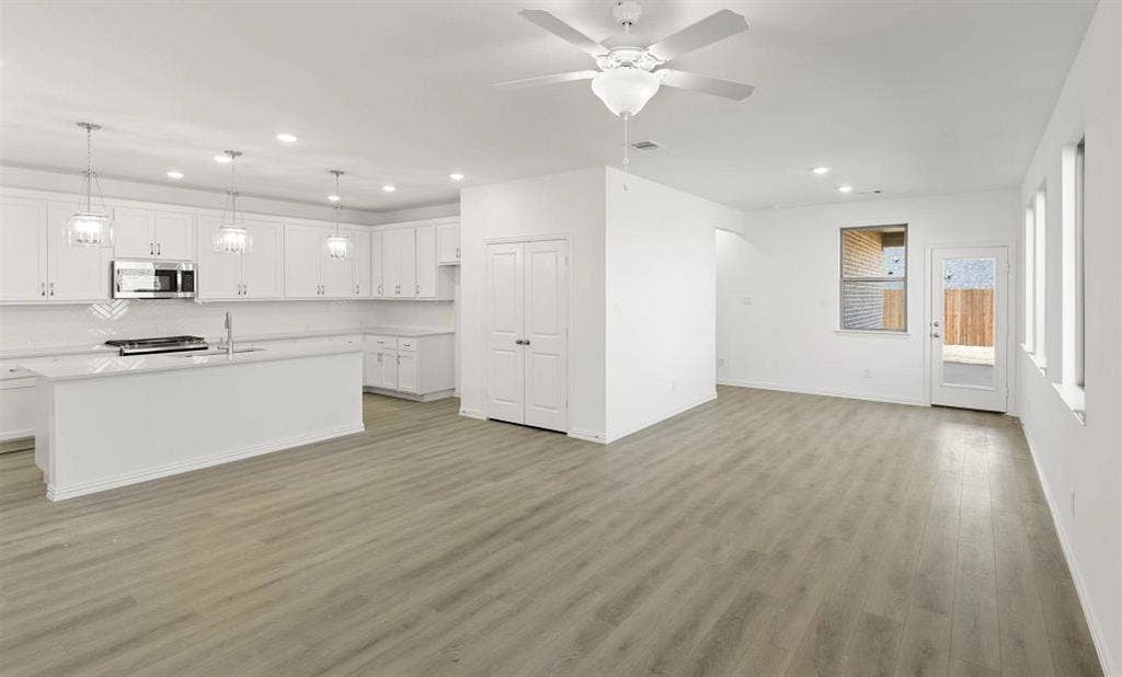 3648 Castle Drive, Celina, TX 75009 Open Kitchen-Living-Dining Room Representative Photo