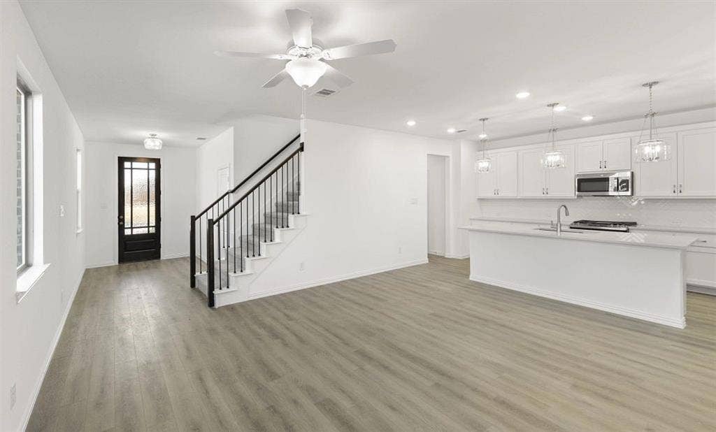 3648 Castle Drive, Celina, TX 75009 Open Kitchen-Living Room Representative Photo