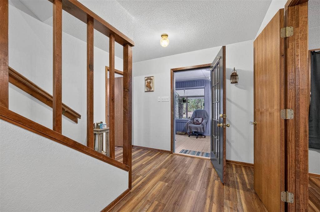 Wood-finish flooring throughout the space