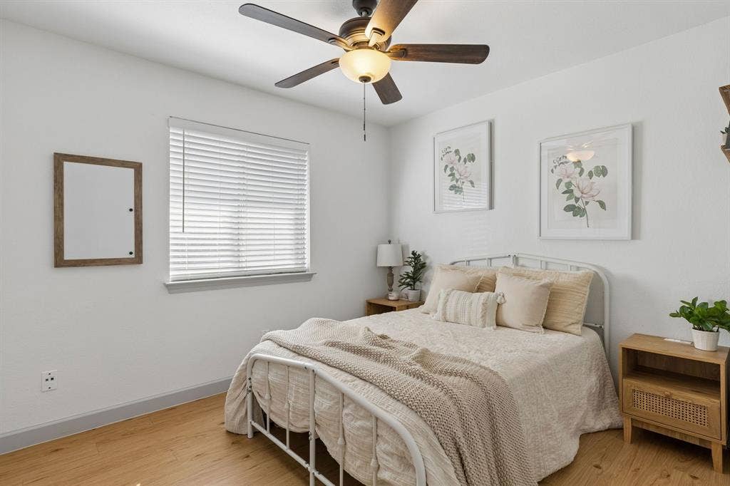 1111 Hyde Park Drive, McKinney, TX 75069 Secondary bedroom featuring a ceiling fan, LVP flooring and a closet
